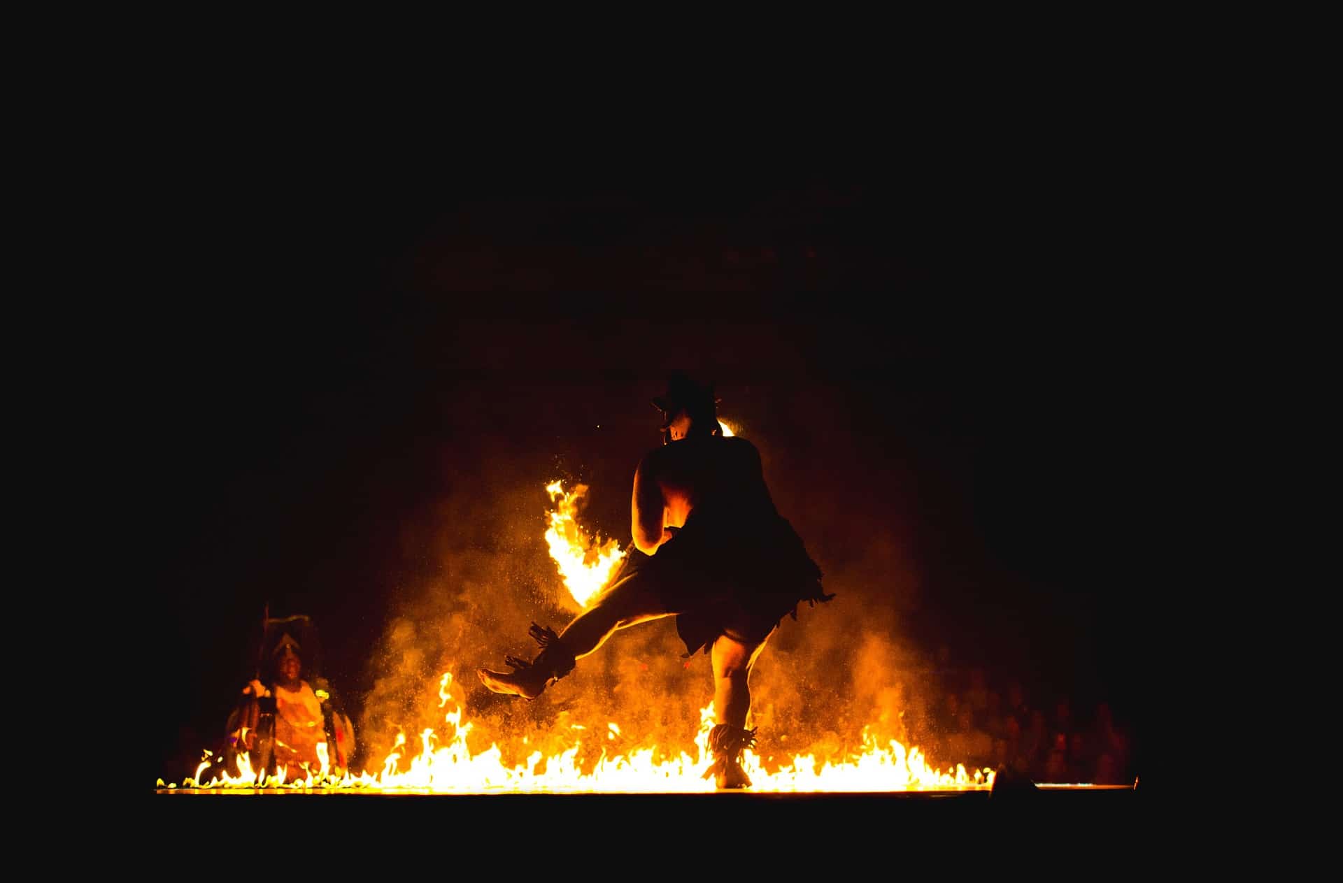 man at bonfire